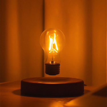 Ambient lighting bulb Mesmerizing night light Floating light bulb Levitating light fixture Modern ambient lamp Magnetic levitation lamp Unique night light Decorative light bulb Innovative ambient lighting LED magnetic night light