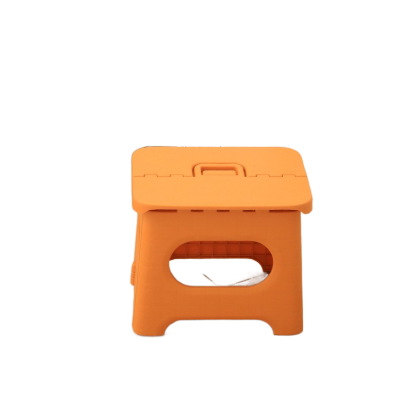 Tabouret orange, Folding stool Portable seating Nordic design stool Outdoor seating Camping stool Fishing chair Compact stool Lightweight seating Travel stool Foldable chair Versatile seating Convenient stool