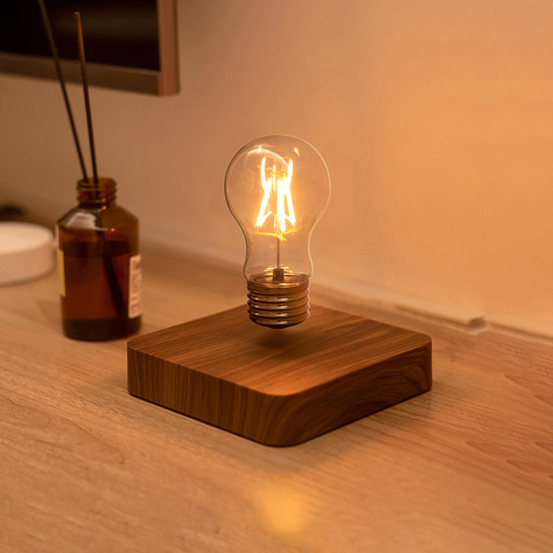 Ambient lighting bulb Mesmerizing night light Floating light bulb Levitating light fixture Modern ambient lamp Magnetic levitation lamp Unique night light Decorative light bulb Innovative ambient lighting LED magnetic night light