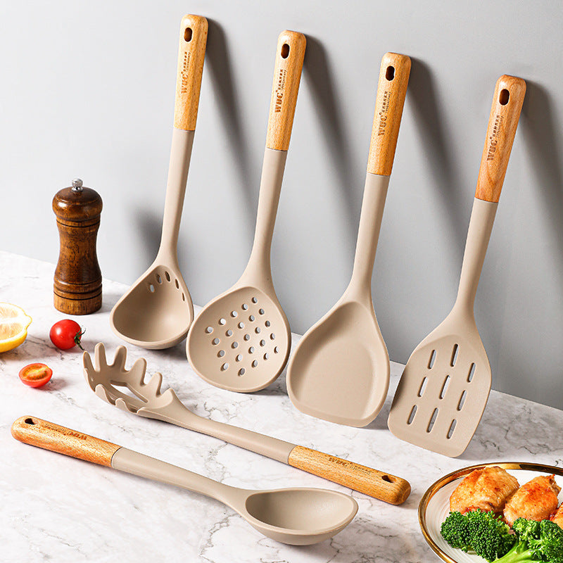 Culinary essentials kit Cooking aid collection Chef's tool set Kitchen helper assortment Cooking utensil assortment Cooking implement set Culinary tool assortment