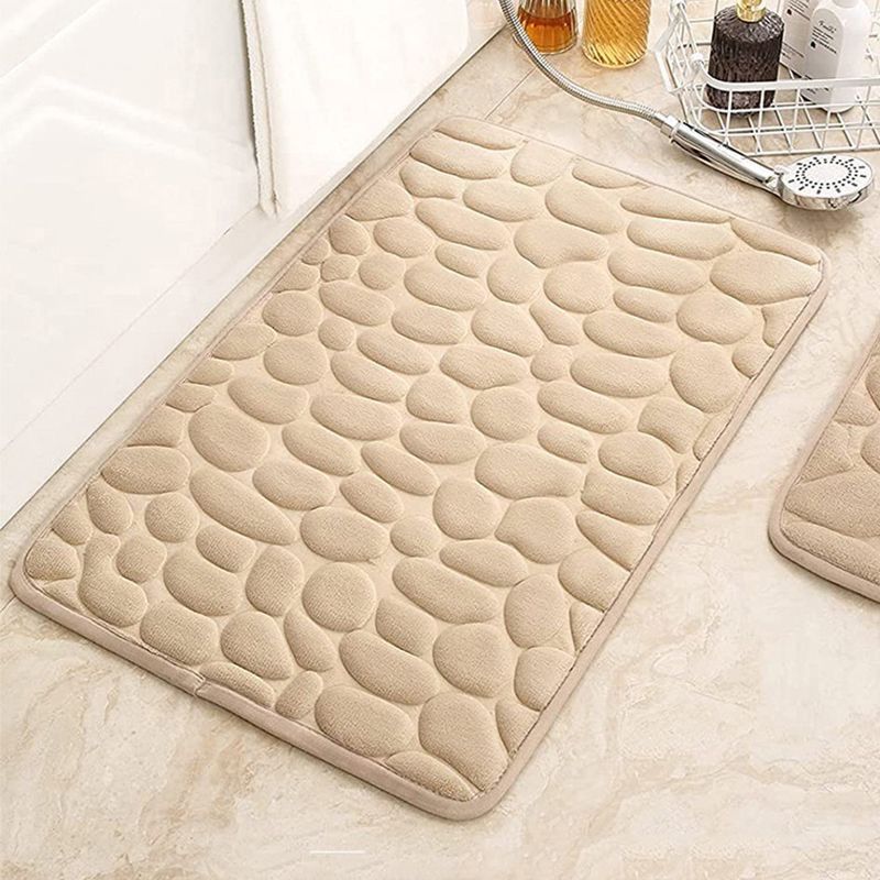 Alfombra de baño de vellón coral con relieve de piedra